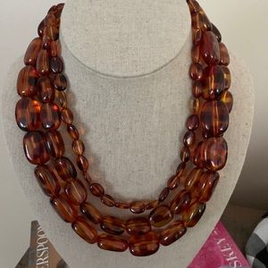 Express tortoise shell necklace.